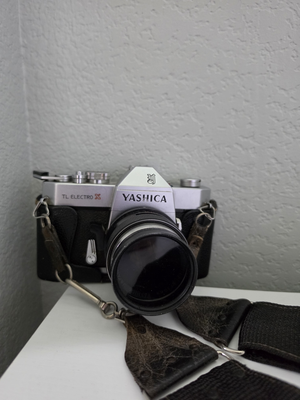 Yashica TL Electro X 35mm Camera in Black and Silver with Leather Strap